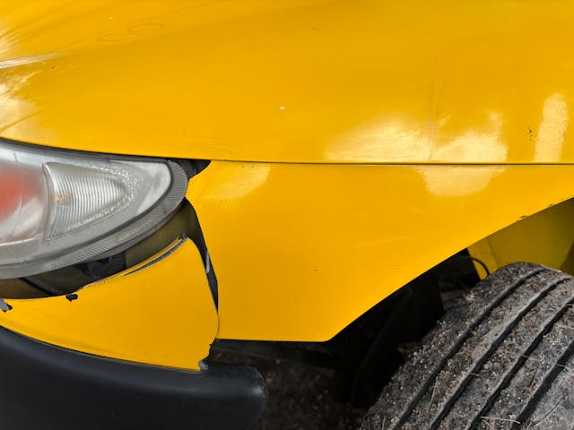 fender bender yellow car