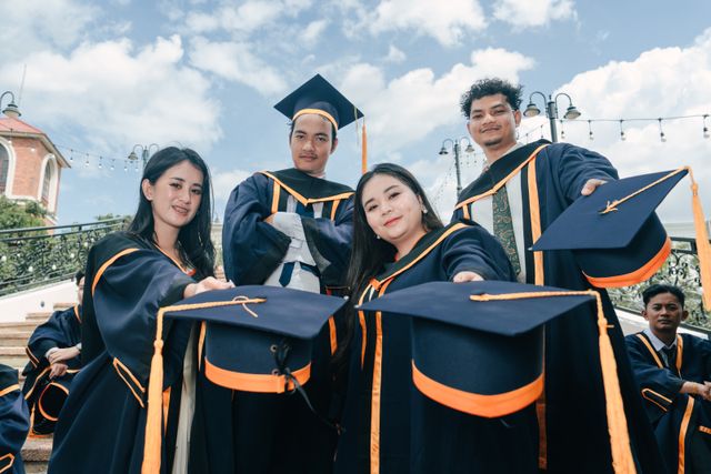 group of college graduates
